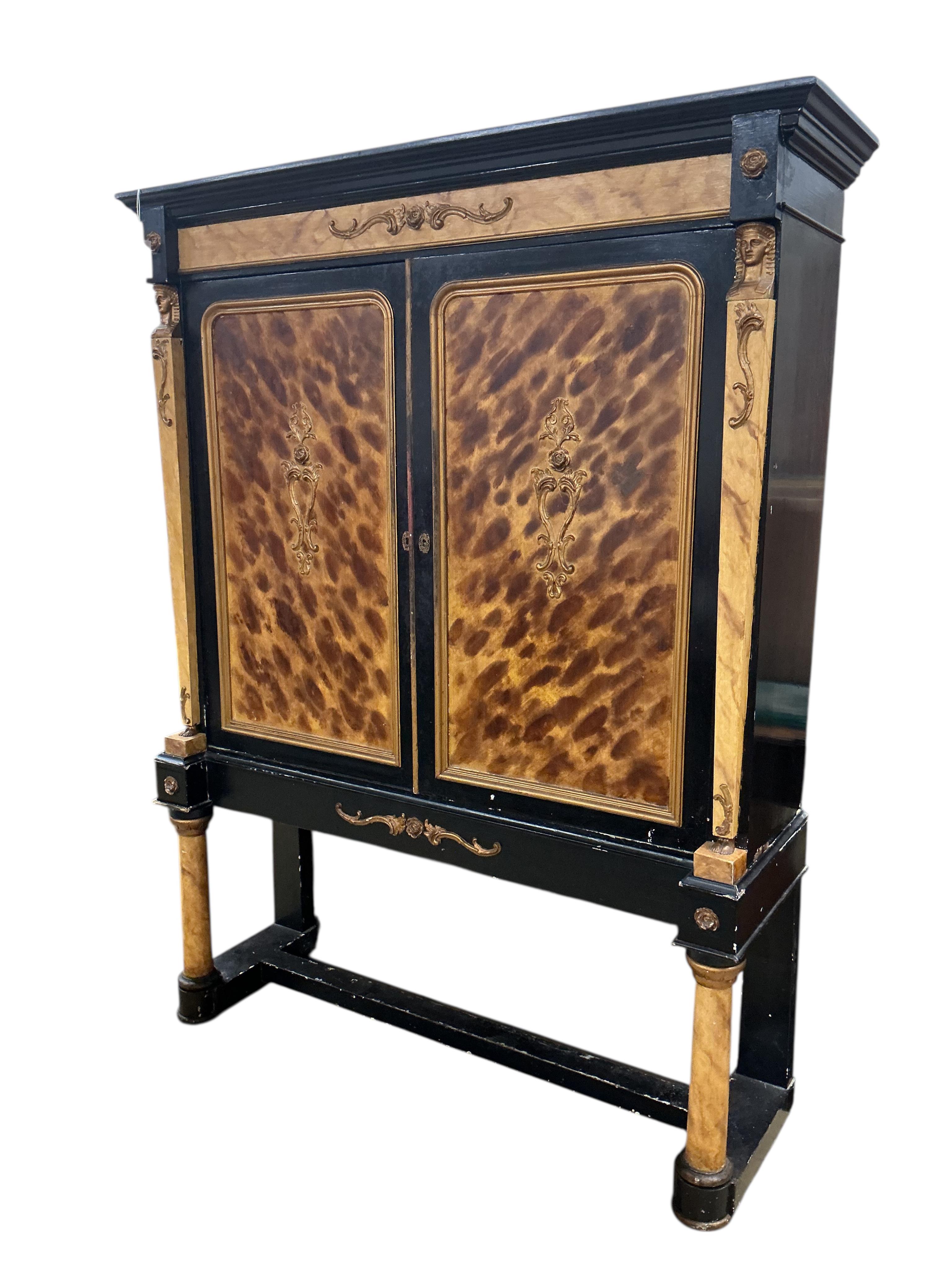 A painted Empire style faux marble two door cabinet on stand, width 140cm, depth 39cm, height 180cm